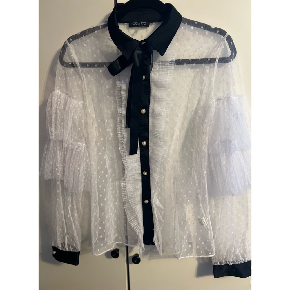 Beautiful white lace blouse with satin collar and pearl buttons.